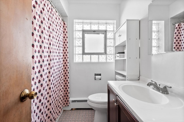 bathroom featuring toilet, a shower with curtain, baseboard heating, tile patterned floors, and vanity