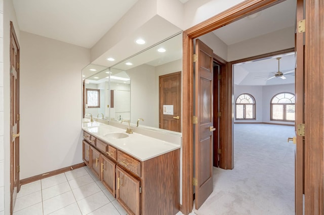 bathroom featuring ceiling fan and vanity