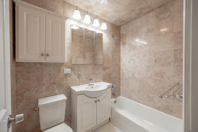 bathroom featuring toilet, tile walls, and vanity