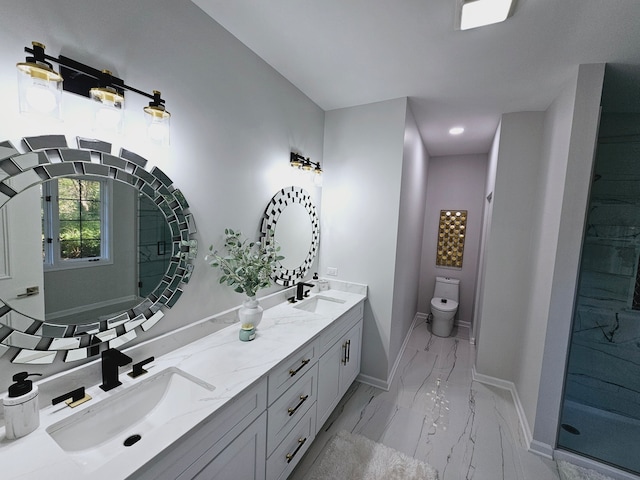 bathroom featuring toilet and vanity