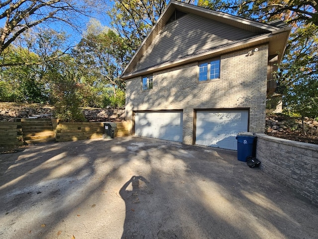 view of home's exterior featuring a garage