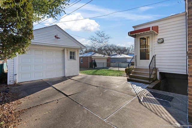 garage featuring a yard