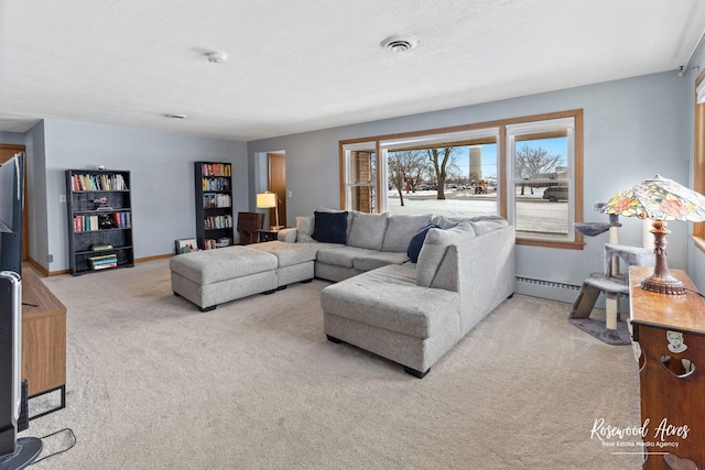 carpeted living room with a baseboard radiator and a textured ceiling