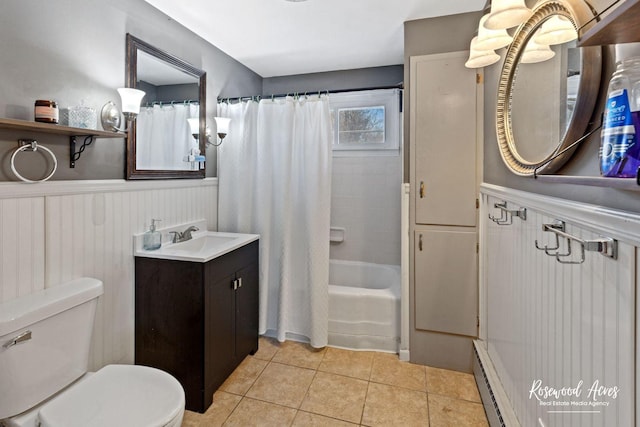 full bathroom featuring a baseboard radiator, shower / bathtub combination with curtain, tile patterned flooring, vanity, and toilet