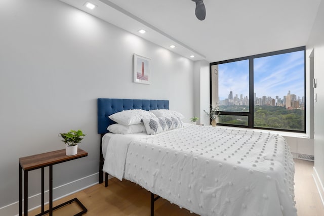 bedroom featuring hardwood / wood-style floors