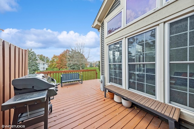 deck featuring a grill