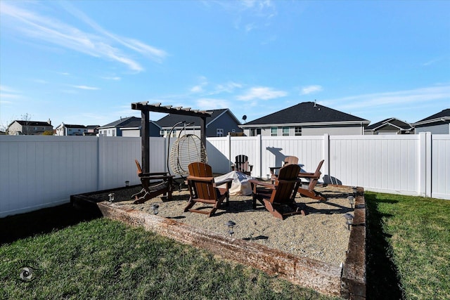 view of yard featuring an outdoor fire pit