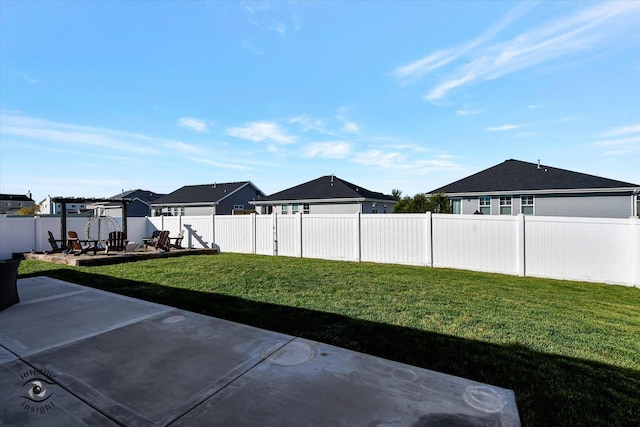 view of yard with a pergola and a patio