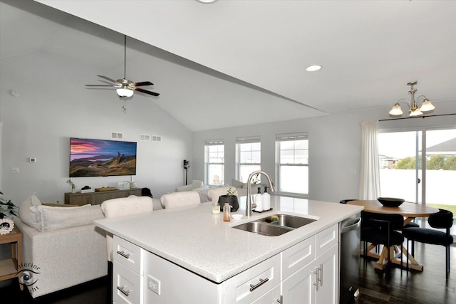 kitchen featuring plenty of natural light, dishwasher, white cabinetry, and sink