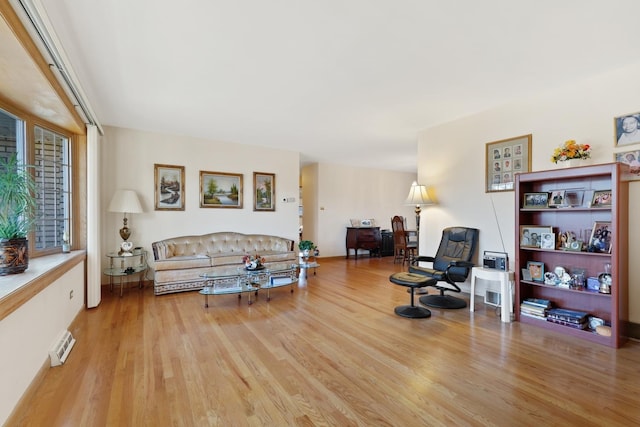 living room with light hardwood / wood-style flooring