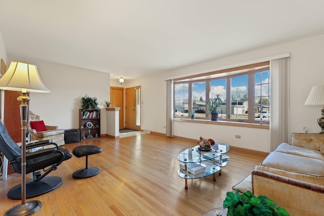 living room with light hardwood / wood-style floors