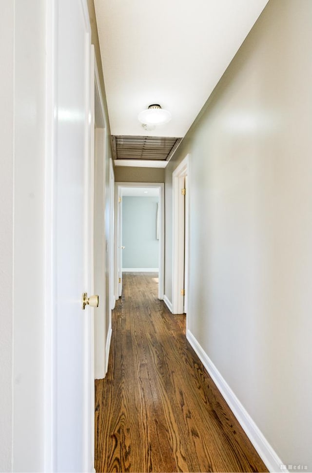 hallway featuring dark hardwood / wood-style floors