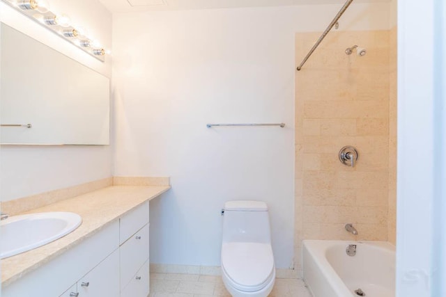 full bathroom featuring toilet, vanity, tile patterned flooring, and tiled shower / bath combo