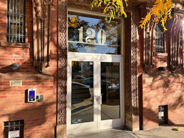 doorway to property featuring french doors