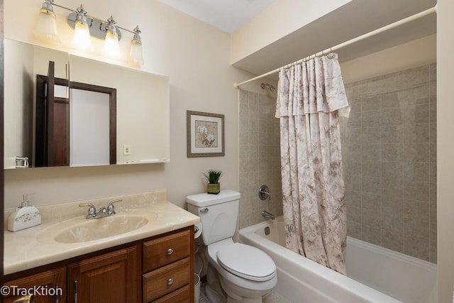 full bathroom with toilet, vanity, and shower / bath combo