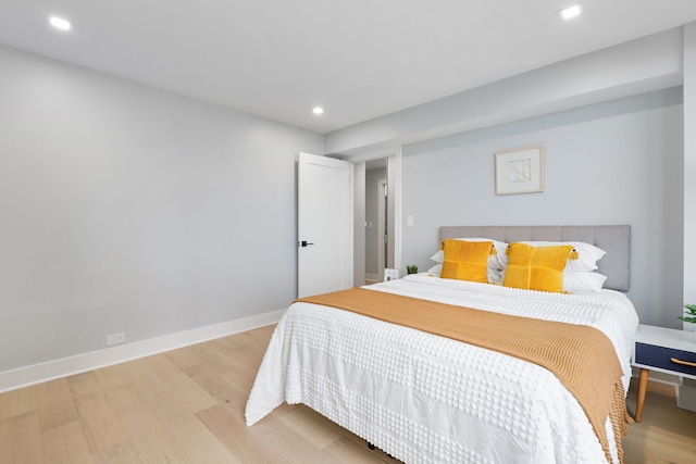 bedroom featuring wood-type flooring