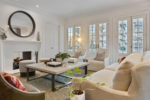 sunroom / solarium featuring french doors, plenty of natural light, and a brick fireplace