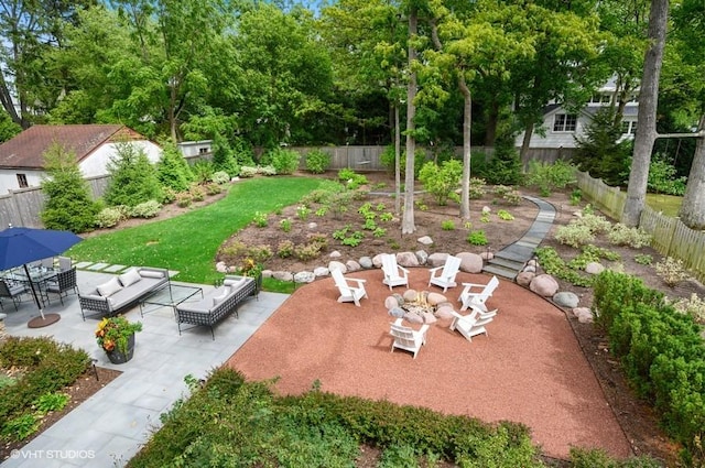 view of yard with a patio area and a fire pit