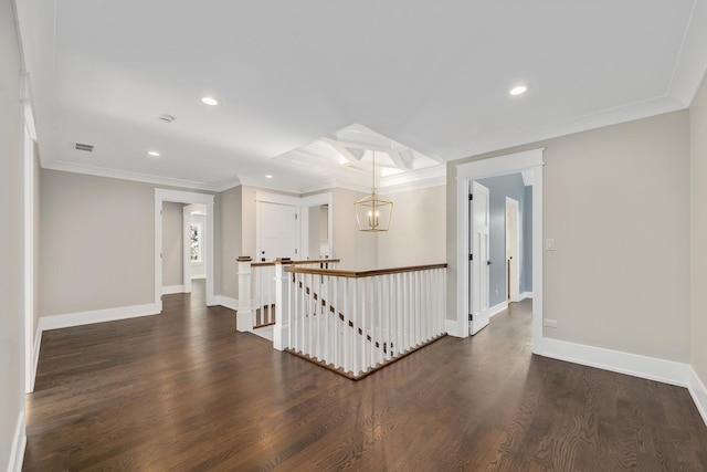 hallway with an inviting chandelier, ornamental molding, and dark hardwood / wood-style floors