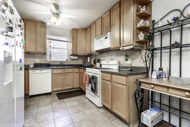 kitchen with ceiling fan, backsplash, sink, white appliances, and light tile patterned flooring