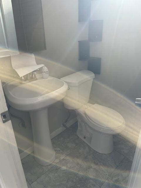 bathroom featuring toilet