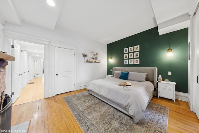 bedroom featuring light wood-type flooring