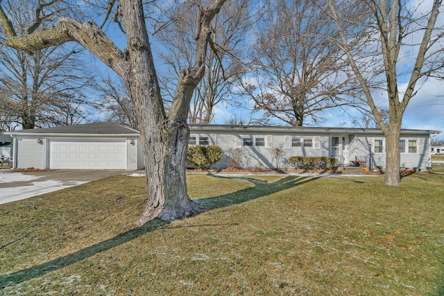 ranch-style house featuring a garage and a front yard