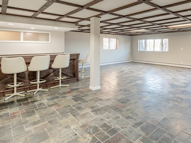 basement with indoor bar