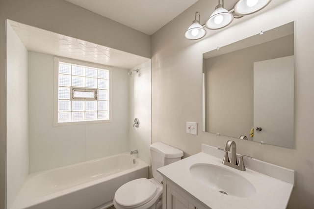 bathroom with toilet and vanity