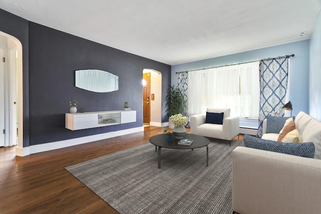 living room with dark wood-type flooring