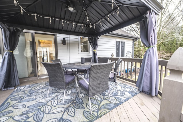 wooden deck with ceiling fan