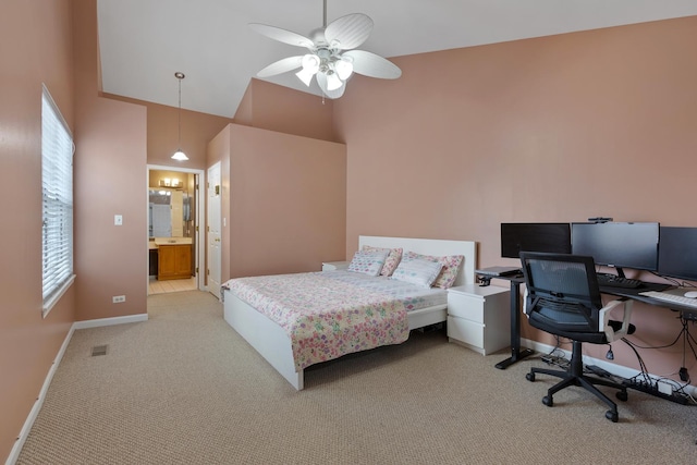 bedroom featuring light colored carpet, visible vents, a towering ceiling, ceiling fan, and baseboards