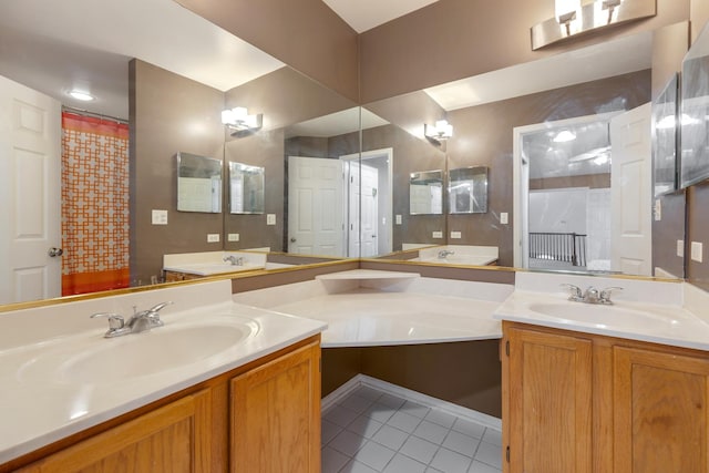 full bath with tile patterned flooring, vanity, and a shower with curtain