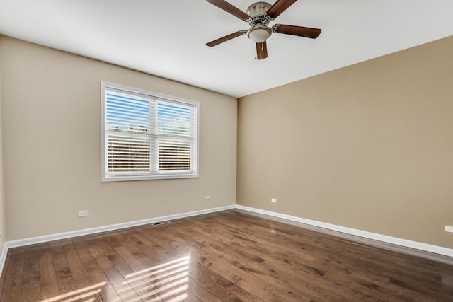 unfurnished room with ceiling fan and hardwood / wood-style flooring