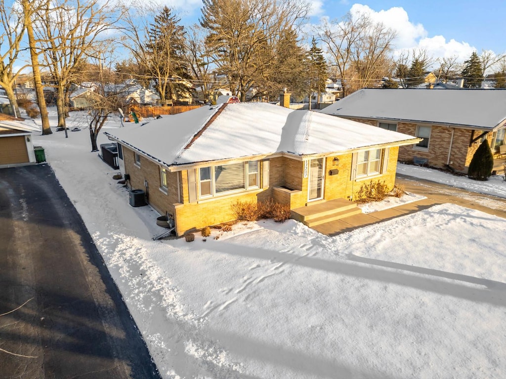 view of front of home with central air condition unit