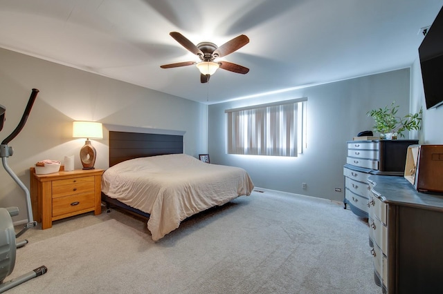 bedroom featuring ceiling fan and light colored carpet