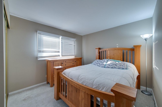 bedroom with light carpet