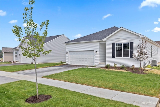 ranch-style house with central AC, a garage, and a front yard