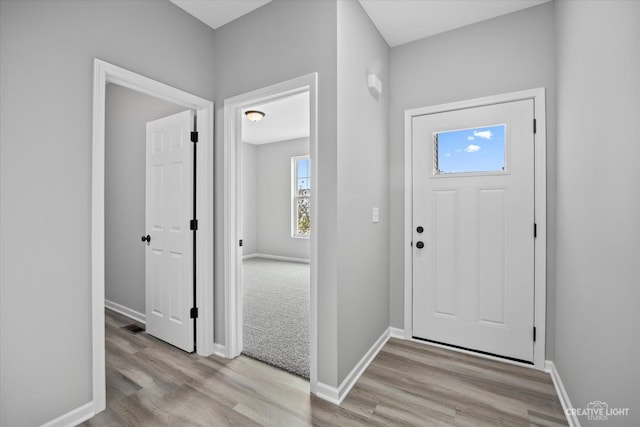 foyer entrance featuring light hardwood / wood-style floors