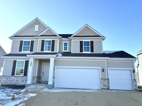 craftsman-style house with a garage