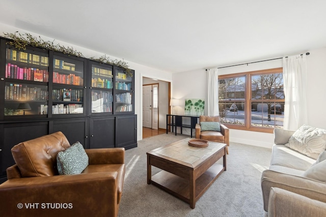 living room featuring light colored carpet