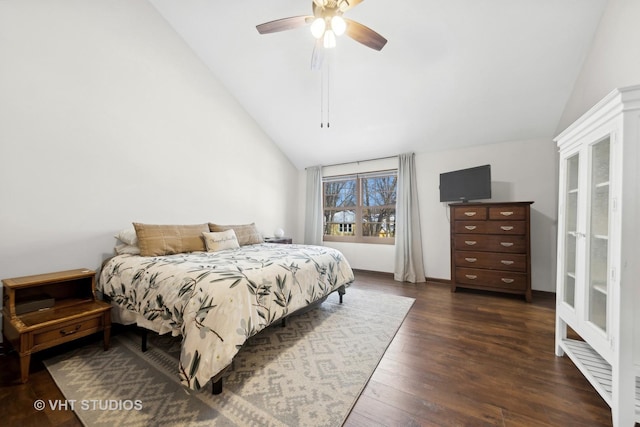 bedroom with lofted ceiling, ceiling fan, and dark hardwood / wood-style flooring