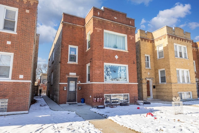 view of snow covered building