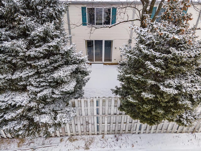 view of snow covered property