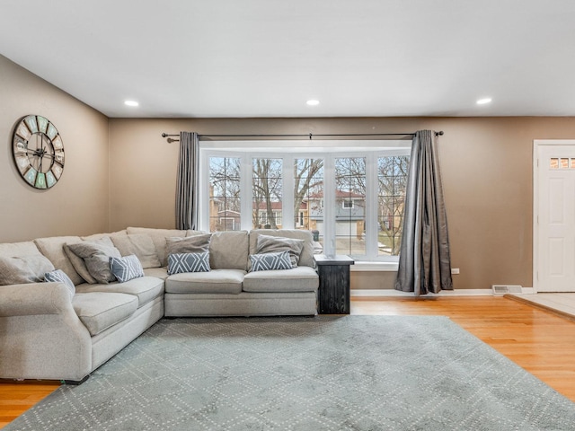 living room with hardwood / wood-style flooring