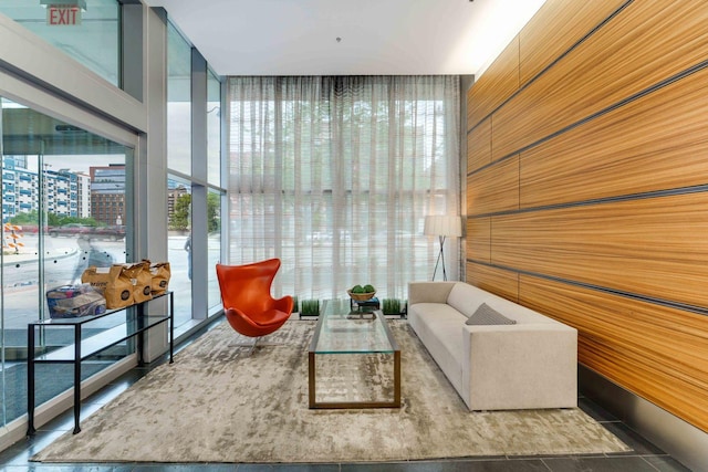 sitting room featuring a wall of windows