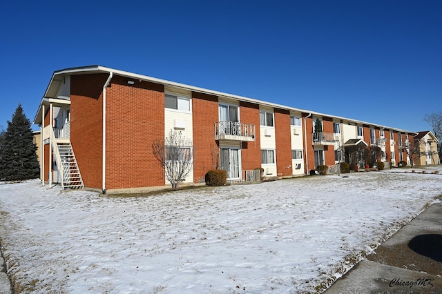 view of snow covered building