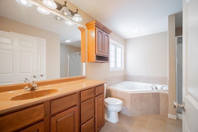 full bathroom with independent shower and bath, tile patterned flooring, vanity, and toilet