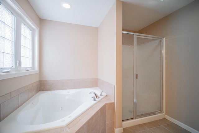 bathroom featuring separate shower and tub and tile patterned floors