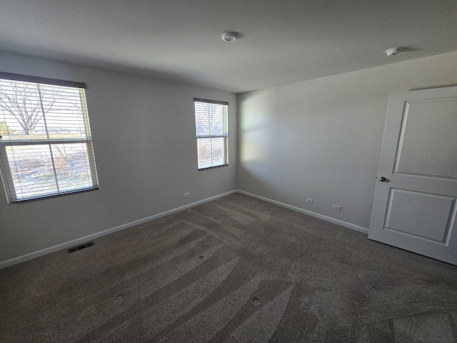 view of carpeted spare room